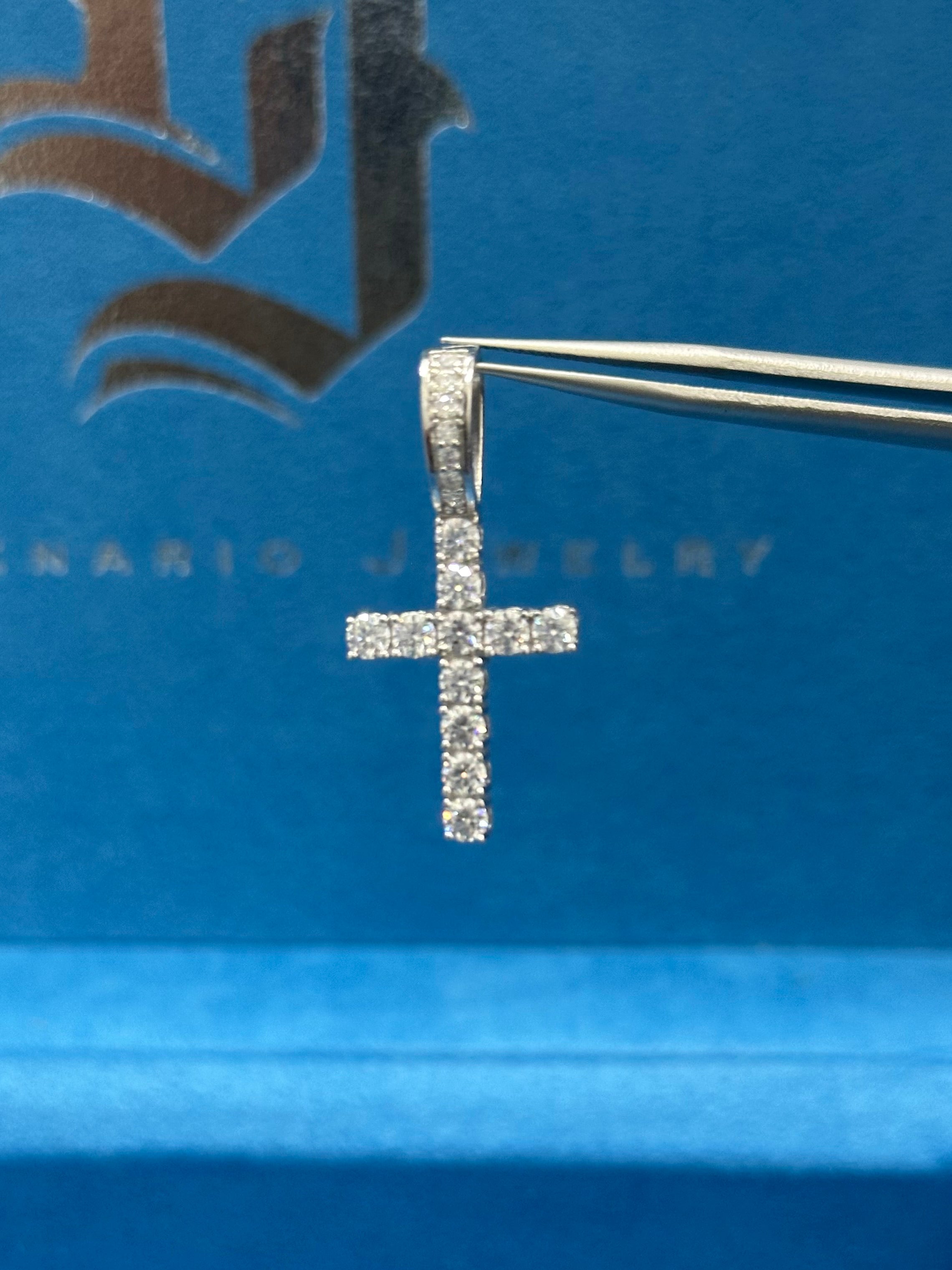 Dije en forma de cruz